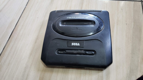 Mega Drive 3 Só O Aparelho Sem Nada Fonte Externa Com Defeito Não Liga!
