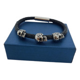 Pulsera Simil Cuero Con 3 Calaveras En Acero Quirurgico