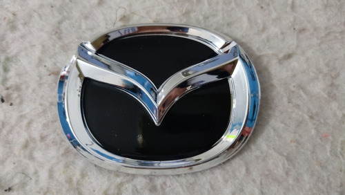 Emblema Logo Insignia Delantero Parrilla Mazda 323 Foto 2