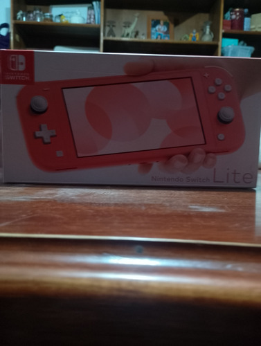 Consola Nintendo Switch Lite Coral+5 Juegos (4 Digitales)