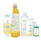 Kit Cuidado Del Bebé Sheló Crema Shampoo Aceite Talco Y Body