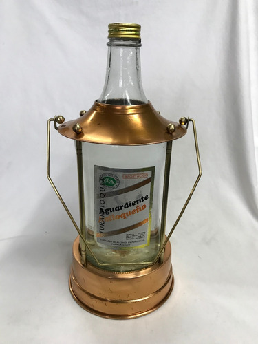 Licorera En Cobre Y Bronce, Con Botella Vacía De Aguardiente