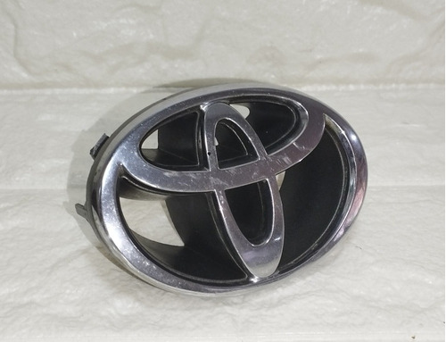 Emblema Frontal Toyota Corolla 93/98 B. Camry Caja2  Foto 2