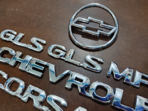 Kit Emblemas Chevrolet Corsa 1.4 Sedan Gls 4puertas 7piezas Foto 4