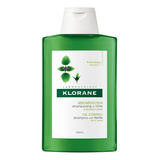 Shampoo Klorane Ortiga En Frasco De 200ml Por 1 Unidad