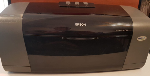 Impresora Epson C67 - Enciende