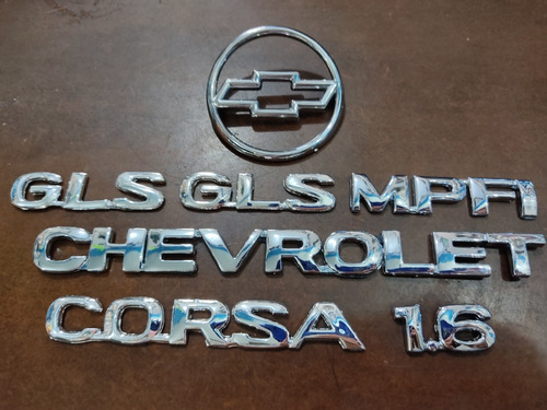 Kit Emblemas Chevrolet Corsa 1.6 Sedan Gls 4puertas 7piezas Foto 4