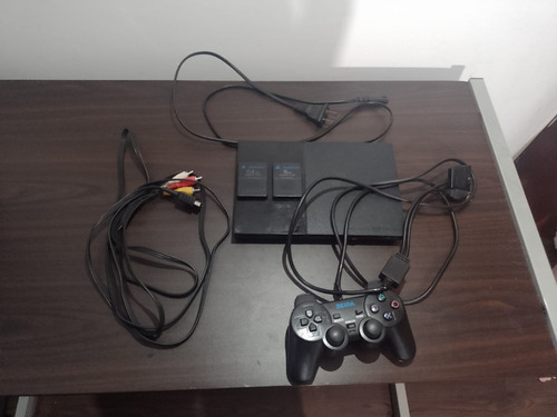 Playstation 2 Slim + Joystick + 2 Memory Cards (descripcion)