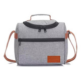 Lonchera Termica Discovery Tira Ajustable Bolsillo Frontal Color Gris Claro