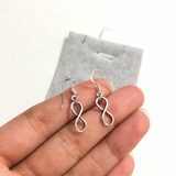 Aros Colgantes De Mujer. Signo Infinito En Plata Fina 925.