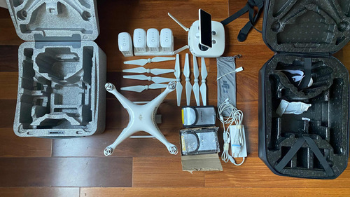 Drone Phantom 4 Pro + 3 Bat + 4 Pares De Hélice + 2 Cases.