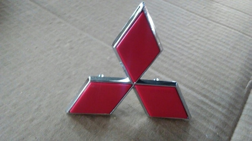 Emblema Mitsubishi Montero Mod Nuevo Con Bases Pata Abierta Foto 2