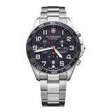 Reloj Pulsera Victorinox Fieldforce Chrono De Cuerpo Color Plata, Analógico, Para Hombre, Fondo Azul, Con Correa De Acero Inoxidable Color Plata, Agujas Color Blanco Y Rojo, Dial Blanco, Subesferas Co