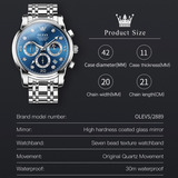 Reloj De Negocios Olevs Quartz Luminous Chronograph Color Del Fondo Plateado/azul