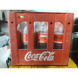 Cajón De Coca Cola Con 9 Botellas Vacías Plásticas De 2 Lt.