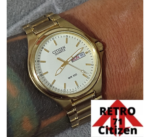Relógio Citizen Executive Dourado.
