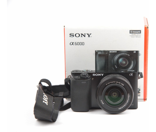 Cámara Sony A6000 Con Grip, Cargador Y 4 Baterías 