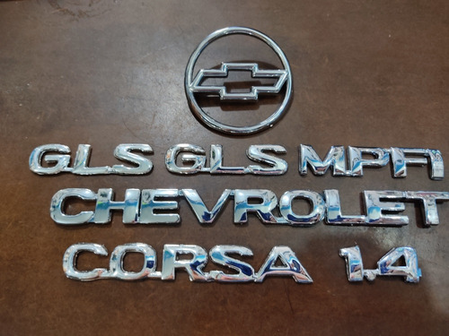 Kit Emblemas Chevrolet Corsa 1.4 Sedan Gls 4puertas 7piezas Foto 2