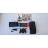 Nintendo Switch + Zelda Breath Of The Wild + Mario Odyssey + Mario Kart 8 Delux +  Case