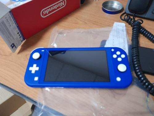 Nintendo Switch Lite Azul Dos Juegos Fisicos 10 Digitales
