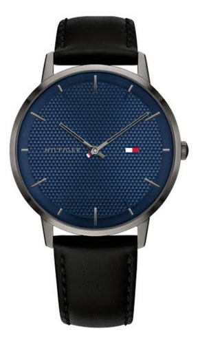 Reloj Tommy Hilfiger Slim 1791702 Color Negro Fondo Azul 