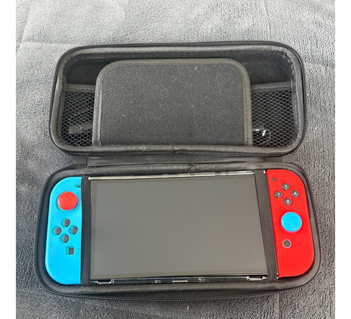 Nintendo Switch Oled 64gb Color Rojo Neón/azul Neón/negro