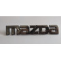 Mazda 323 Emblema Persiana 