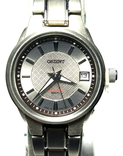 Reloj Orient Dama De Titanium Blanco  Con Calendario Sumerg.