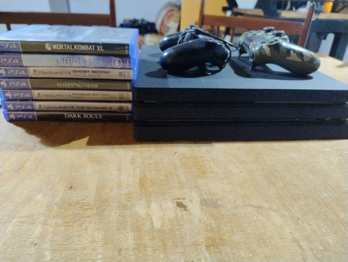 Playstation 4 Pro Usada + Coleccion De Juegos+ Dos Controles