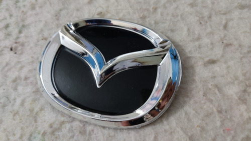 Emblema Logo Insignia Delantero Parrilla Mazda 323 Foto 3
