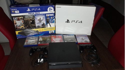 Ps4 Slim Usada, Incluye: 1tb+cables+2joystick+5 Juegos 