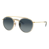 Anteojos De Sol Ray-ban Round Double Bridge Standard Con Marco De Metal Color Polished Gold, Lente Blue De Cristal Degradada, Varilla Polished Gold De Metal - Rb3647n