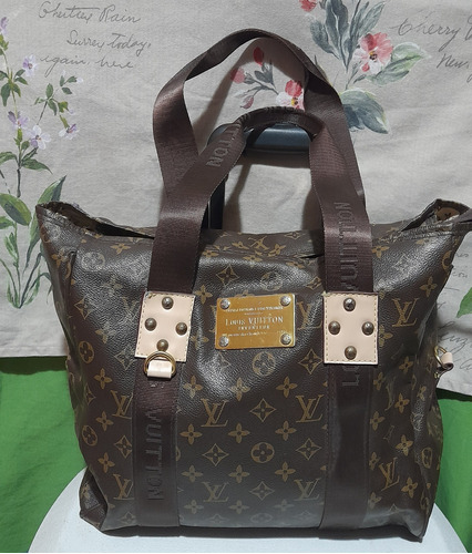 Bolsa Louis Vuitton.