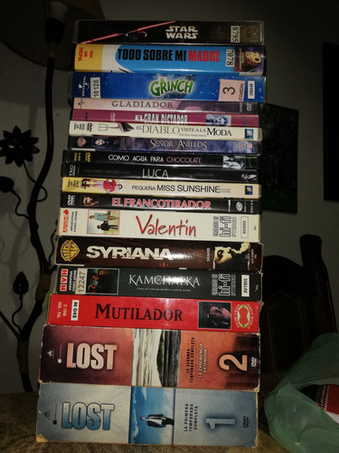 Lote Vhs Y Dvds. 29 Discos Y Videos. 