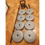 Kit Barra + 2 Mancuerna + 8 Discos Pvc 5 Kg + Pesa Rusa 