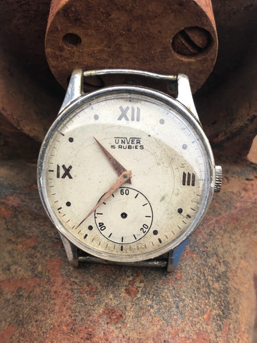Reloj Unver, 15 Jewels, Swiss Made, Cal. 853, No Funciona.