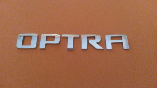 Emblema  Palabra Optra Chevrolet  En Metal Pulido Foto 4