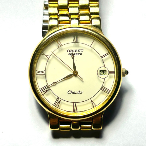 Rrloj Orient Modelo Chandor Electro Dorado En Oro 22k.