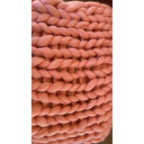 Manta Nordica Color Coral . Medidas 1.40 X 0.80
