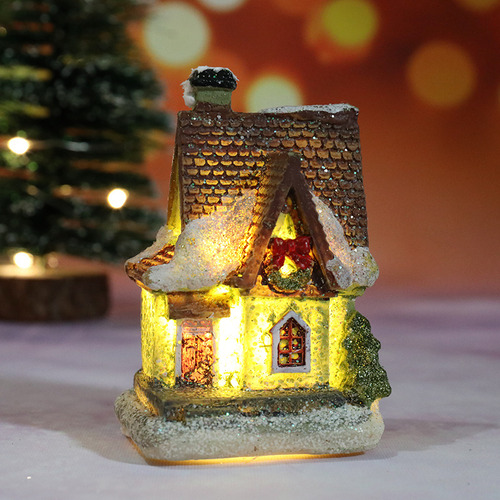 Pequeñas Casas De Resina Brillan Con Decoraciones Navideñas