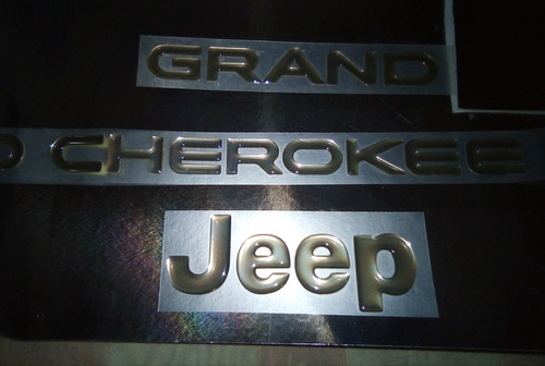 Emblema Jeep Grand Cherokee Original Resina 2 Piezas Foto 6