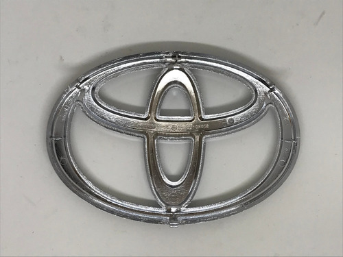 Emblema Parrilla Toyota Hilux 2008-2012 (75311-0k050) Foto 6