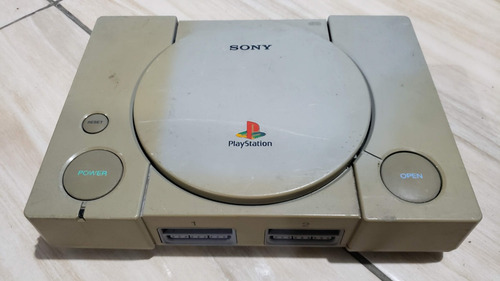 Playstation 1 Fat Só O Aparelho. O Leitor Não Leu Os Jogos. Tá Com Defeito. 576.  M50