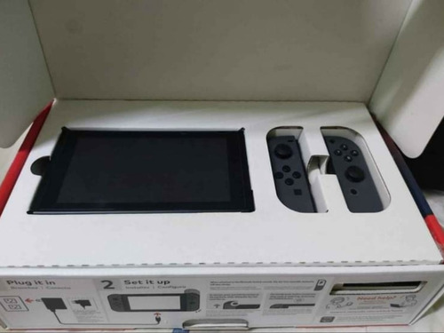 Nintendo Switch Gris Con 2 Juegos Y Accesorios