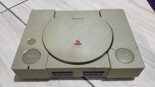 Playstation 1 Fat Só O Aparelho. O Leitor Não Leu Os Jogos. Tá Com Defeito. 017.  M53