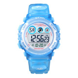 Reloj Niños Niñas Skmei 1451 Digital Alarma Cronometro Color De La Malla Celeste Transparente Color Del Fondo Blanco