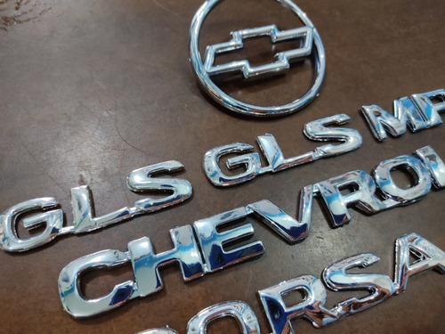 Kit Emblemas Chevrolet Corsa 1.6 Sedan Gls 4puertas 7piezas Foto 5