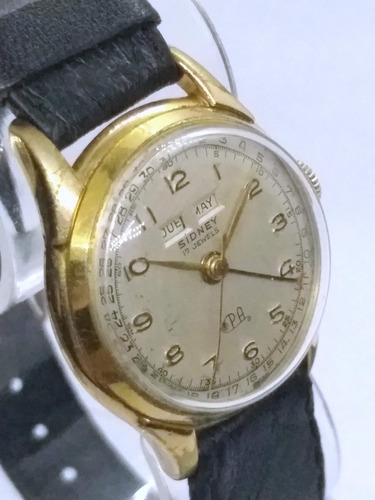 Antiguo Reloj Sidney Triple Fechador Cuerda. Rado Tag Omega 