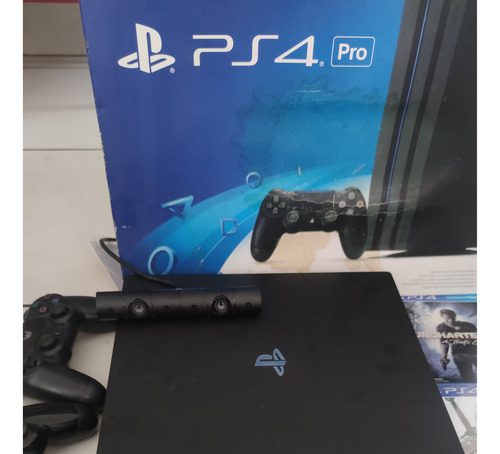 Playstation 4 Pro 1tb 2 Controles + Ps Cam + 8 Jogos  E Caixa Original.