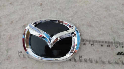 Emblema Logo Insignia Delantero Parrilla Mazda 323 Foto 5